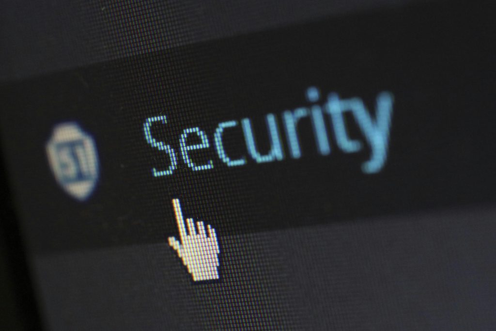 the word security in a search box, with a hand cursor hovering it